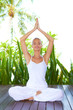 Woman doing yoga breathing exercises
