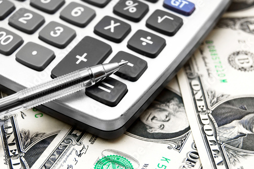 Photo: The calculator, pen and money. The calculator, pen and money.