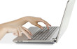 Woman typing on notebook