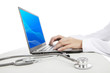 Doctor with stethoscope and laptop