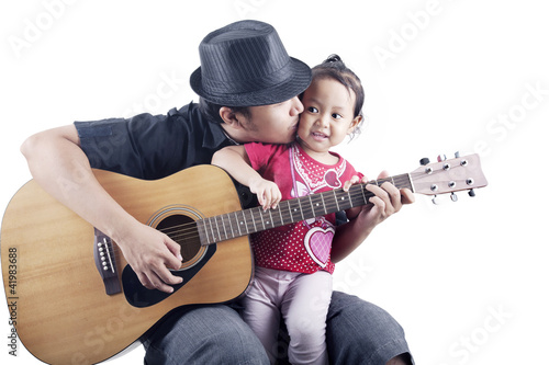 Photo: Musician with his daughter Musician with his daughter