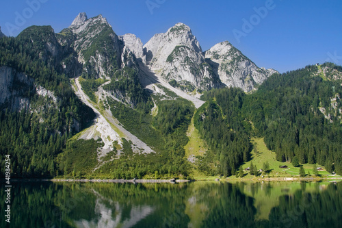 Photo: Mountains bordering a lake Mountains bordering a lake