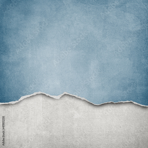 Photo: riped vintage paper on grunge background riped vintage paper on grunge background