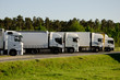 canvas print picture - LKW's auf einem Parkplatz
