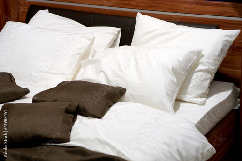 Photo: Nice pillows on a contemporary bed Nice pillows on a contemporary bed