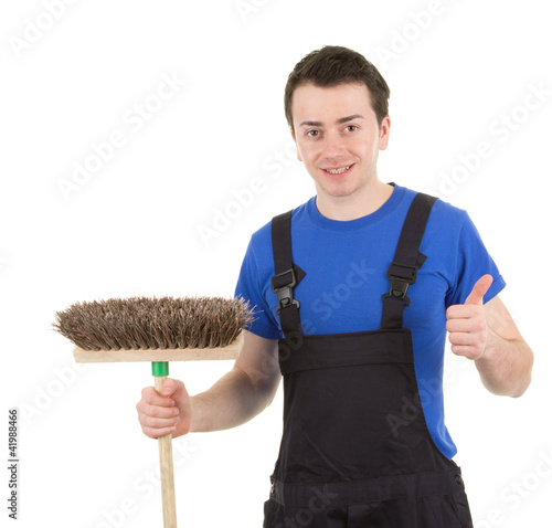 Photo: Worker with a broom Worker with a broom