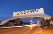 Marbella Arch illuminated at night. Andalusia, Spain