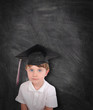 Foto: Young Graduation Student and Chalk Board Young Graduation Student and Chalk Board