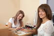 manicurist working with  female nails