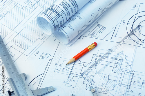 Photo: The plan industrial details, a ruler, caliper, divider and a red The plan industrial details, a ruler, caliper, divider and a red