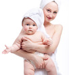 Young mum and beautiful baby after bathing