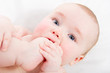 Adorable baby sucking his toe