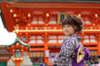 Cute Girl in Kimono at Fushimi-inari Shrine