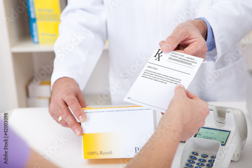 Foto: Buying prescription medicine at drugstore Buying prescription medicine at drugstore