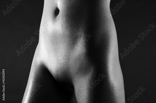 Photo: Abdomen of a young woman Abdomen of a young woman