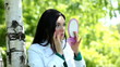 Pretty woman applying make up