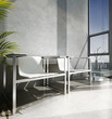 Modern chairs in front of window with sea view