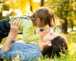 Woman with child in autumn
