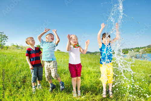 Photo: Kids enjoying water splashes Kids enjoying water splashes