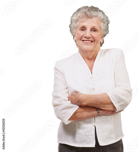 Foto: portrait of a adorable senior woman standing over white backgrou portrait of a adorable senior woman standing over white backgrou