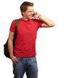 portrait of young man talking on mobile over white background