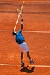Match de tennis sur terre battue : service