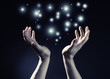 Hands joined together with glow light