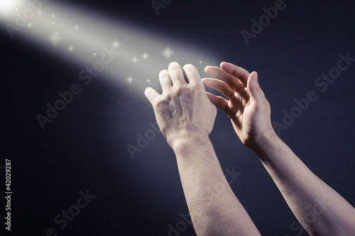 Photo: Prayer raised hands Prayer raised hands