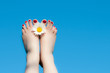 women feet and flower