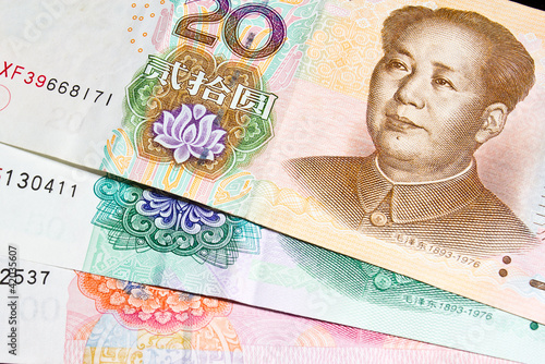 Foto: Background of different denominations of chinese money Background of different denominations of chinese money