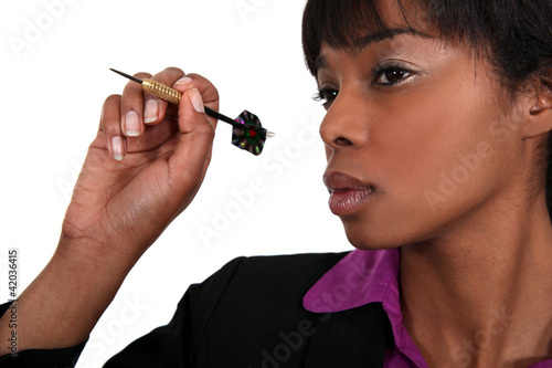 Photo: Woman with dart arrow Woman with dart arrow