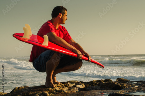 Photo: Surfer watching the waves Surfer watching the waves