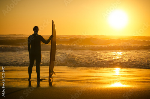 Photo: A surfer watching the waves A surfer watching the waves