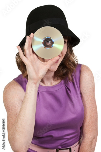 Foto: Woman holding CD or DVD Woman holding CD or DVD