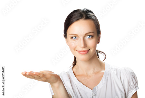 Photo: Business woman showing, isolated Business woman showing, isolated