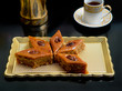 Photo: Oriental sweets baklava on a white background Oriental sweets baklava on a white background