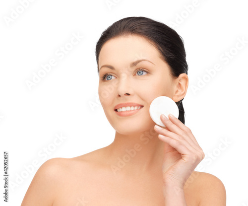 Photo: beautiful woman with cotton pad beautiful woman with cotton pad