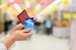 Photo: Woman gets credit card from purse in store Woman gets credit card from purse in store