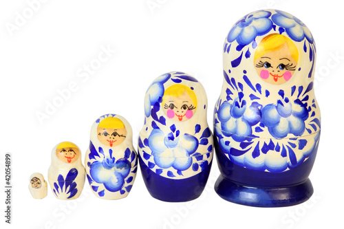 Photo: Set of five blue painted Russian matryoshkas isolated on white Set of five blue painted Russian matryoshkas isolated on white