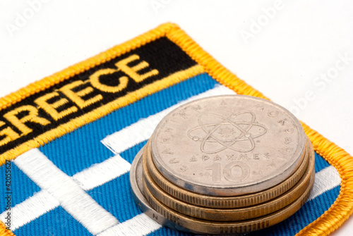 Photo: greek flag and drachmas greek flag and drachmas