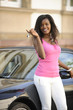 african american woman with her new car
