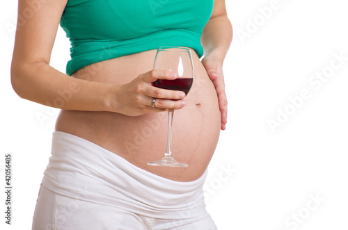 Photo: Babybauch mit Rotweinglas Babybauch mit Rotweinglas