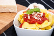 Tortellini in a bowl with ingredients