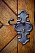 Photo: Retro keyhole in old wooden door Retro keyhole in old wooden door