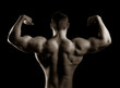 Bodybuilder showing his muscles