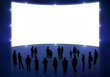 People standing before Cinema Screen