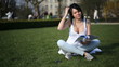 Young pretty woman study in park