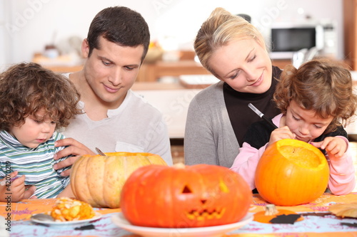 Photo: family preparing Halloween together family preparing Halloween together