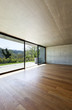 Foto: modern concrete house with hardwood floor, detail window modern concrete house with hardwood floor, detail window