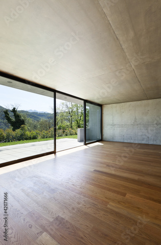 Foto: modern concrete house with hardwood floor, detail window modern concrete house with hardwood floor, detail window